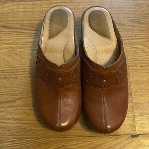 Brown Dansko clogs with pretty design